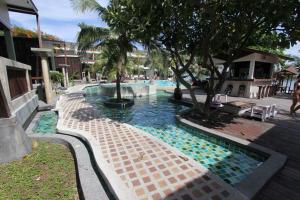 Бассейн в отеле Cocohut Village Beach Resort на Пангане